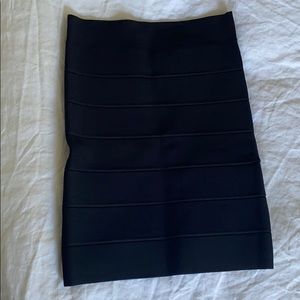 Never worn! S body in black skirt